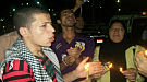 مظاهرة بالشموع ضد الطوارئ في الغربية